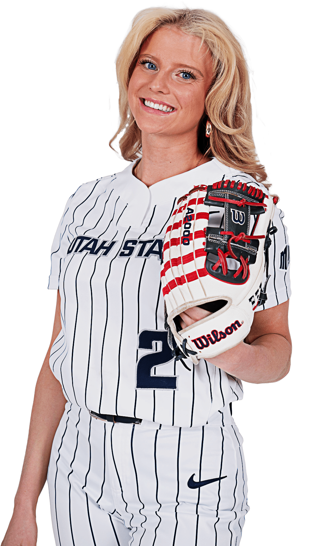 Women's soccer player posing in her jersey