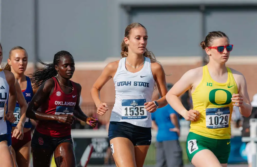 Women's track athlete running